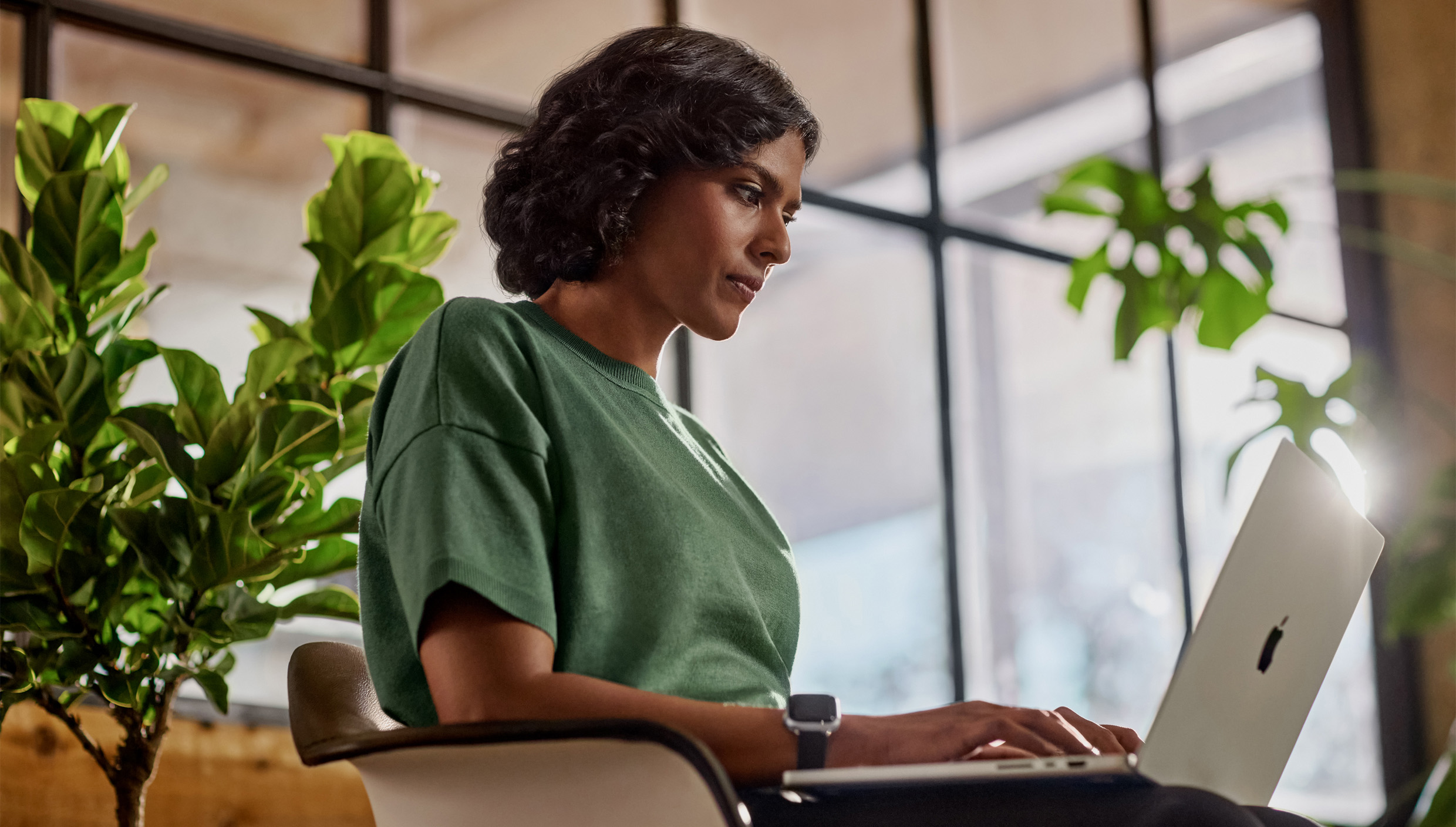 A person working on a MacBook.