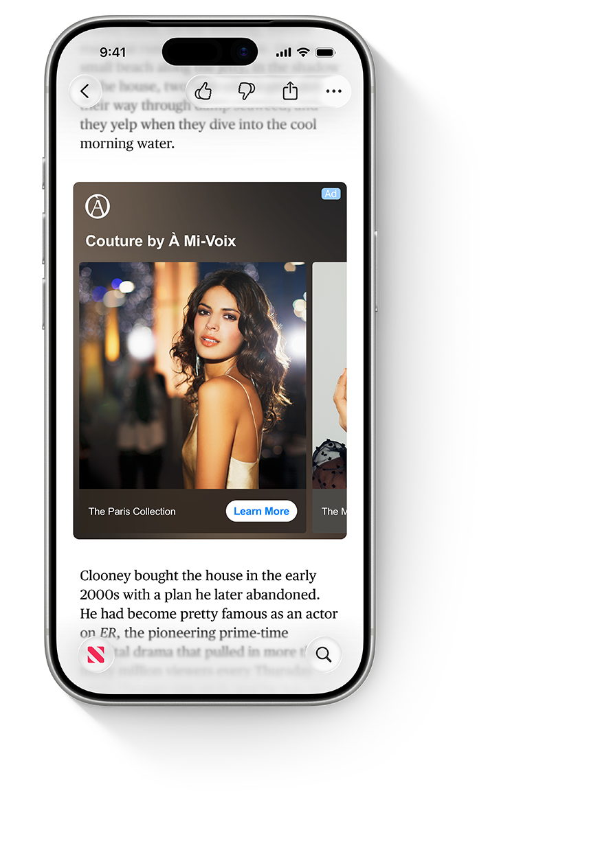 An iPhone with the Apple News app open, showing an ad for Á Mi-Voix within an Esquire article.
