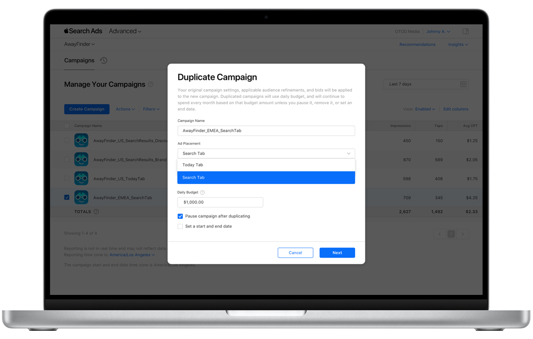 The Campaigns dashboard in Apple Search Ads showing a list of four campaigns for the example app, TripTrek. One campaign is selected. A modal labeled Duplicate Campaign is overlaid on the page. The selected campaign is filled into the Campaign Name field; the ad placement is set at Search tab; the daily budget is set as $1,000, and the checkbox “Pause campaign after duplicating” is selected.